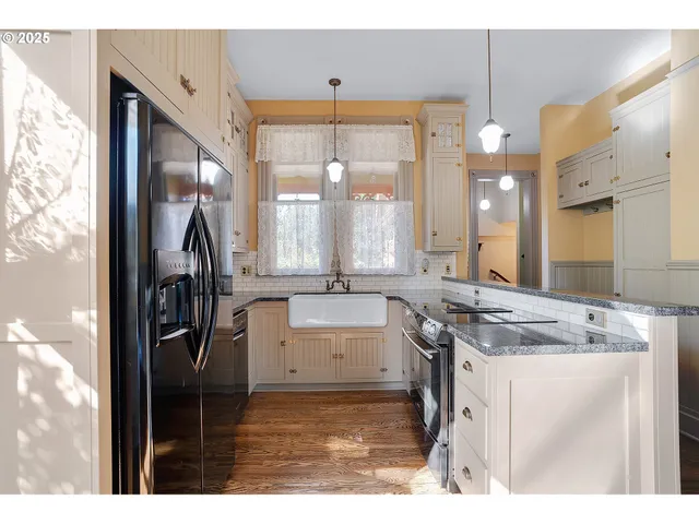 a bathroom with a sink a vanity and a mirror