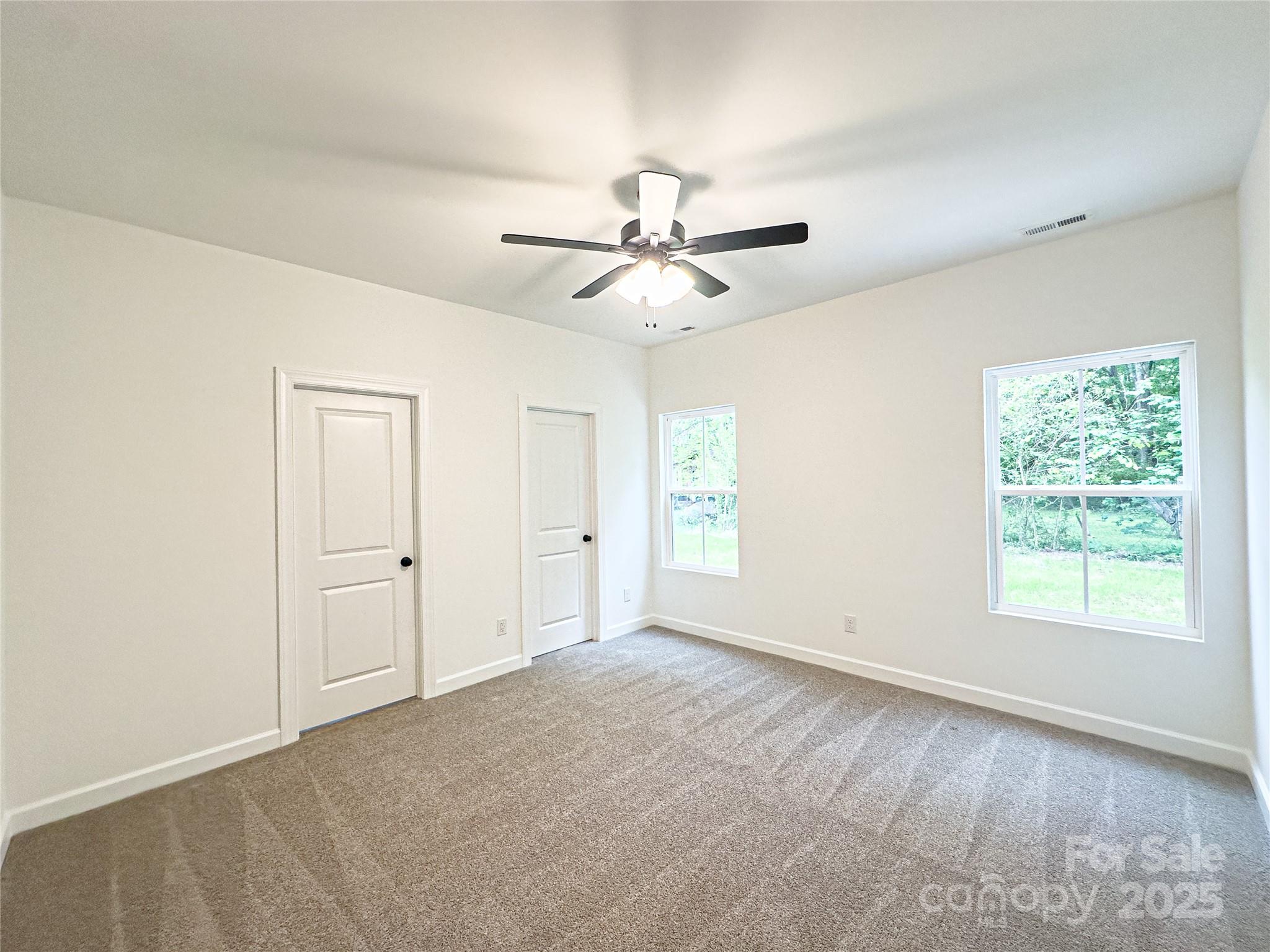 400 1/2 South Yadkin Avenue Spencer, NC 28159 - Photo 15 of 16 a view of an empty room with a window