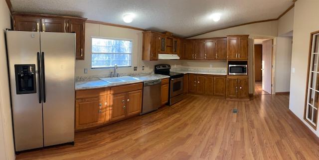 2740 Rutrough Road Southeast Roanoke, VA 24014 - Photo 13 of 27 a kitchen with stainless steel appliances granite countertop a refrigerator a sink dishwasher a stove and white countertops with wooden floor