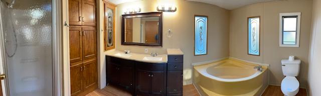 2740 Rutrough Road Southeast Roanoke, VA 24014 - Photo 21 of 27 a bathroom with a sink and a mirror