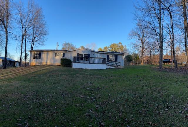 2740 Rutrough Road Southeast Roanoke, VA 24014 - Photo 6 of 27 a view of a house with a big yard and large trees