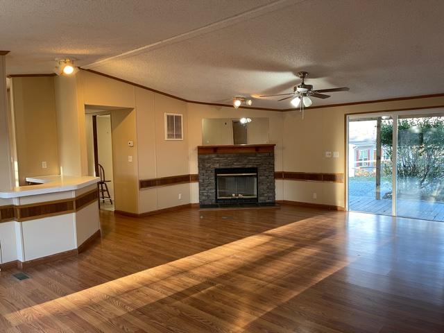 2740 Rutrough Road Southeast Roanoke, VA 24014 - Photo 8 of 27 a view of a livingroom with furniture a ceiling fan and window