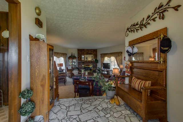 1035 Mill Road Dickson, TN 37055 - Photo 2 of 20 First impressions are the most important! Your guests will be impressed when they enter the front door. This dramatic entry foyer has marble flooring and opens into the sunken great room and kitchen..