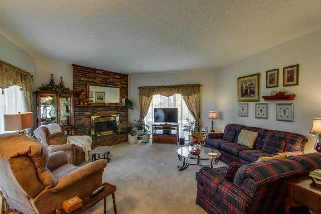 1035 Mill Road Dickson, TN 37055 - Photo 4 of 20 The living room is HUGE! There is plenty of natural light and a beautiful fireplace