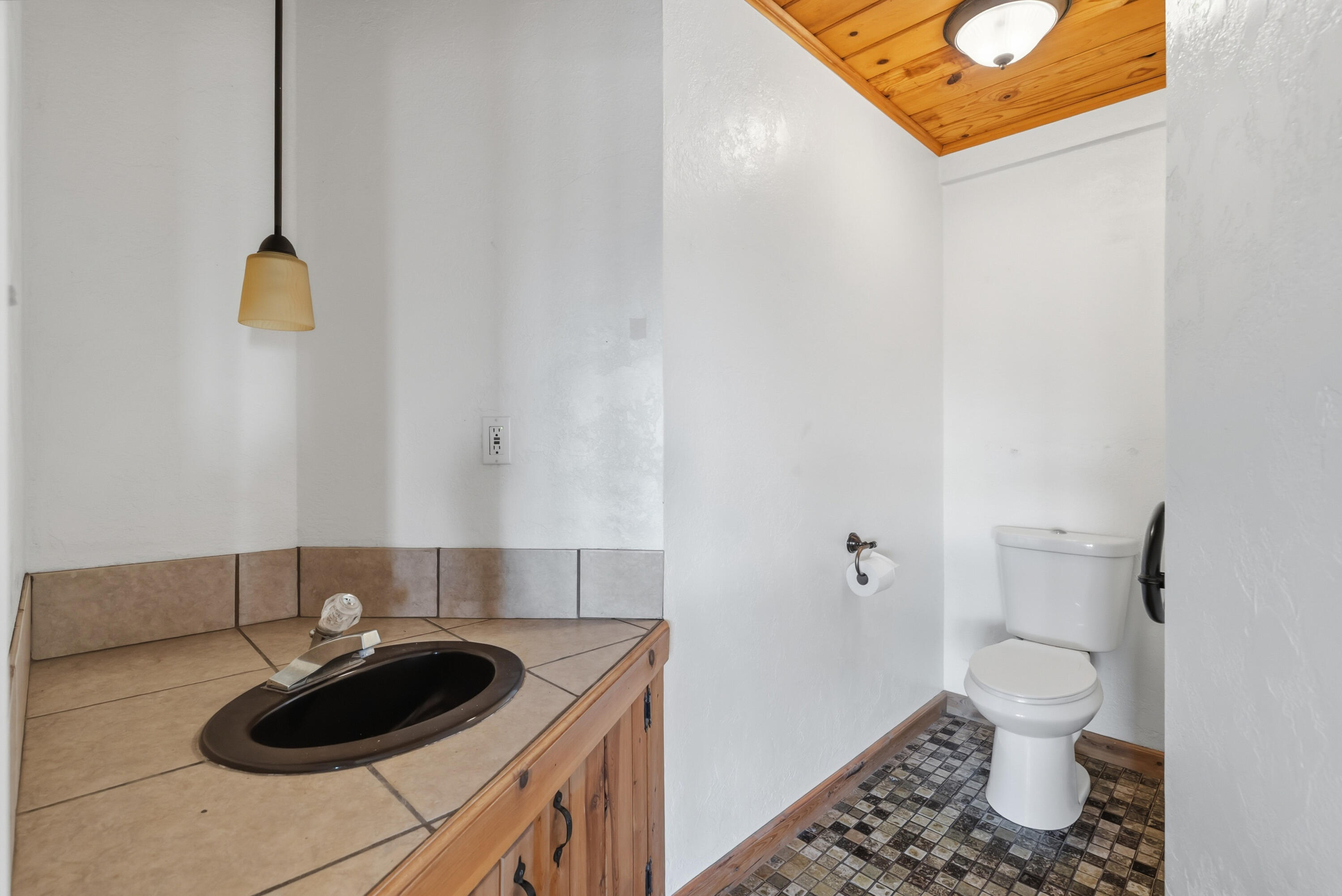 6866 Alpine Ridge Road Shingletown, CA 96088 - Photo 20 of 58 a bathroom with a sink and a toilet