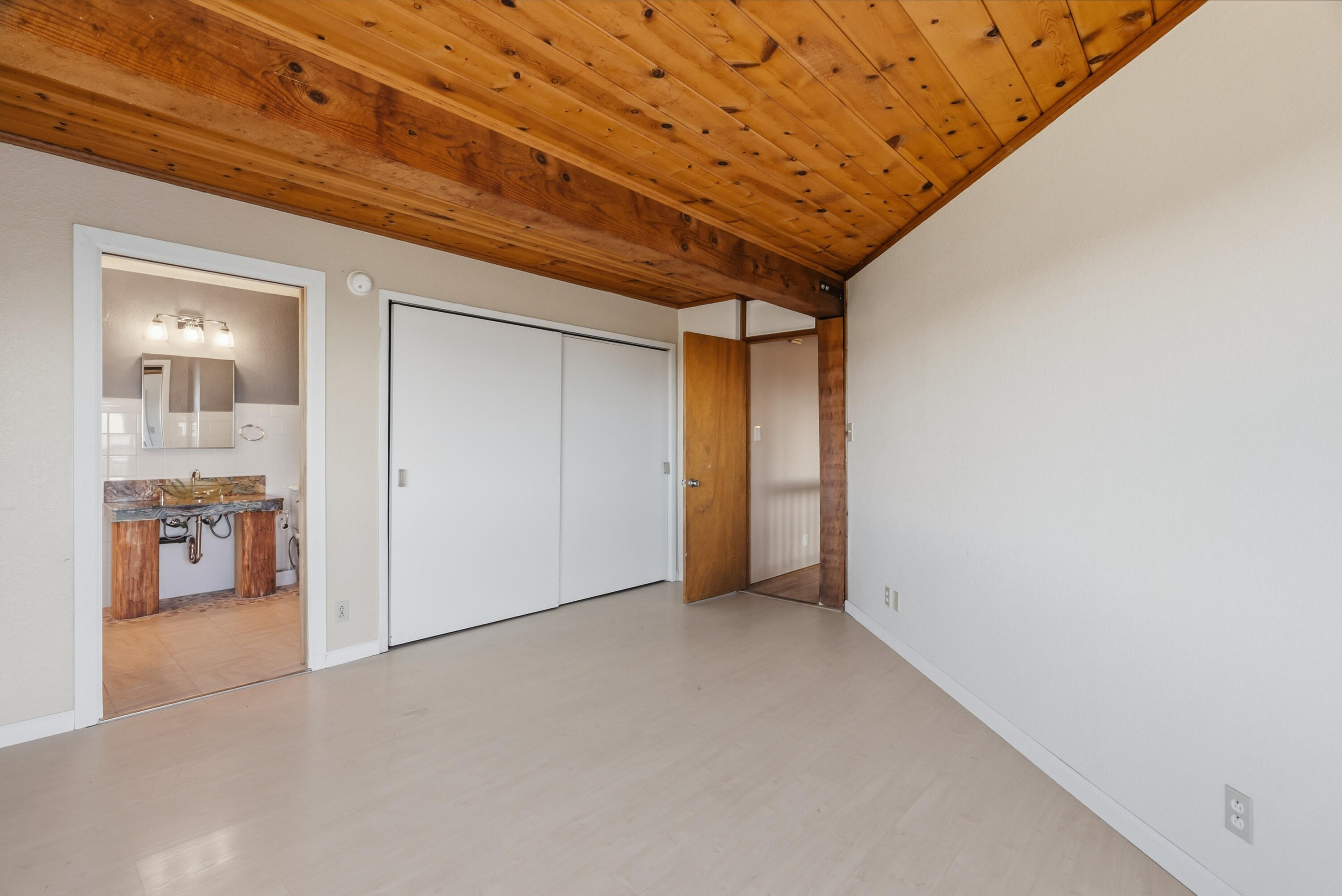 6866 Alpine Ridge Road Shingletown, CA 96088 - Photo 23 of 58 a view of hallway with wooden floor