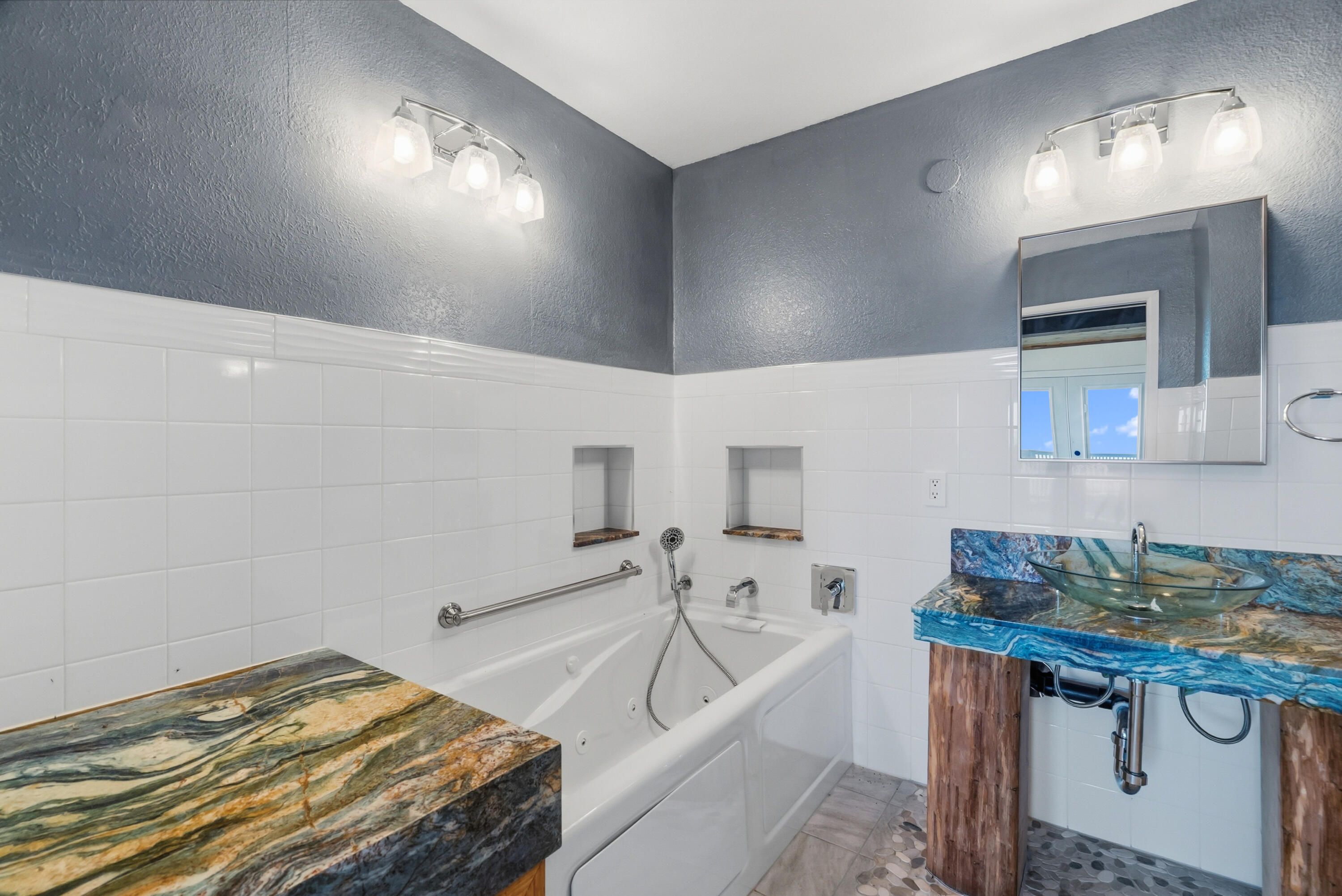 6866 Alpine Ridge Road Shingletown, CA 96088 - Photo 24 of 58 a bedroom with a bed and a sink