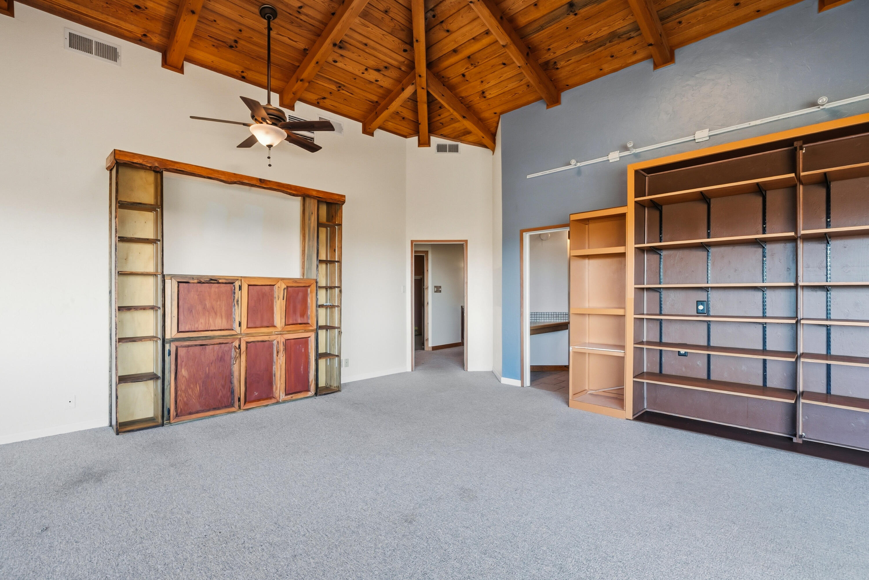 6866 Alpine Ridge Road Shingletown, CA 96088 - Photo 29 of 58 a view of a big room with closet and racks on the wall