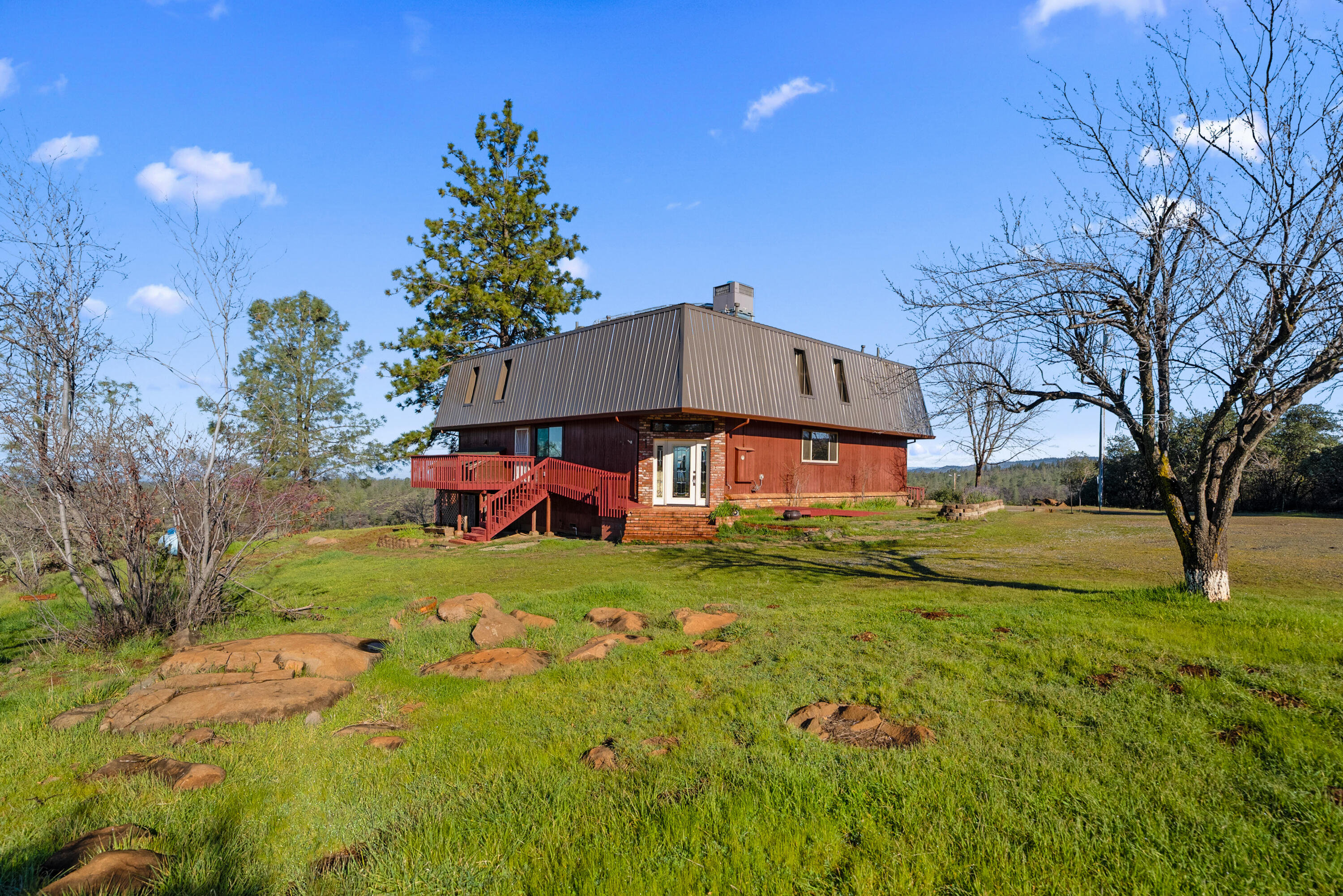 6866 Alpine Ridge Road Shingletown, CA 96088 - Photo 51 of 58 a view of a house with a big yard