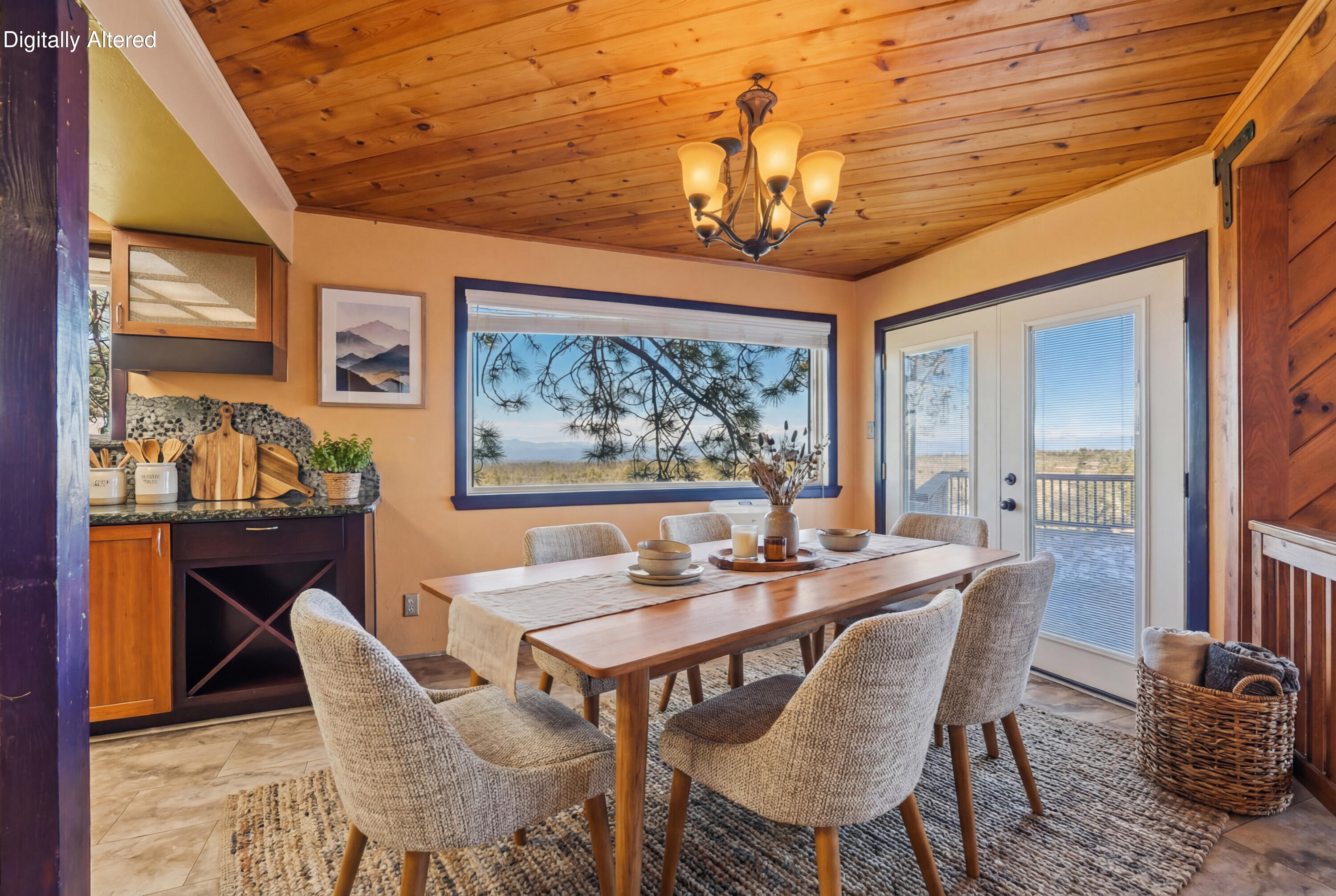 6866 Alpine Ridge Road Shingletown, CA 96088 - Photo 7 of 58 a view of a dining room with furniture wooden floor and chandelier
