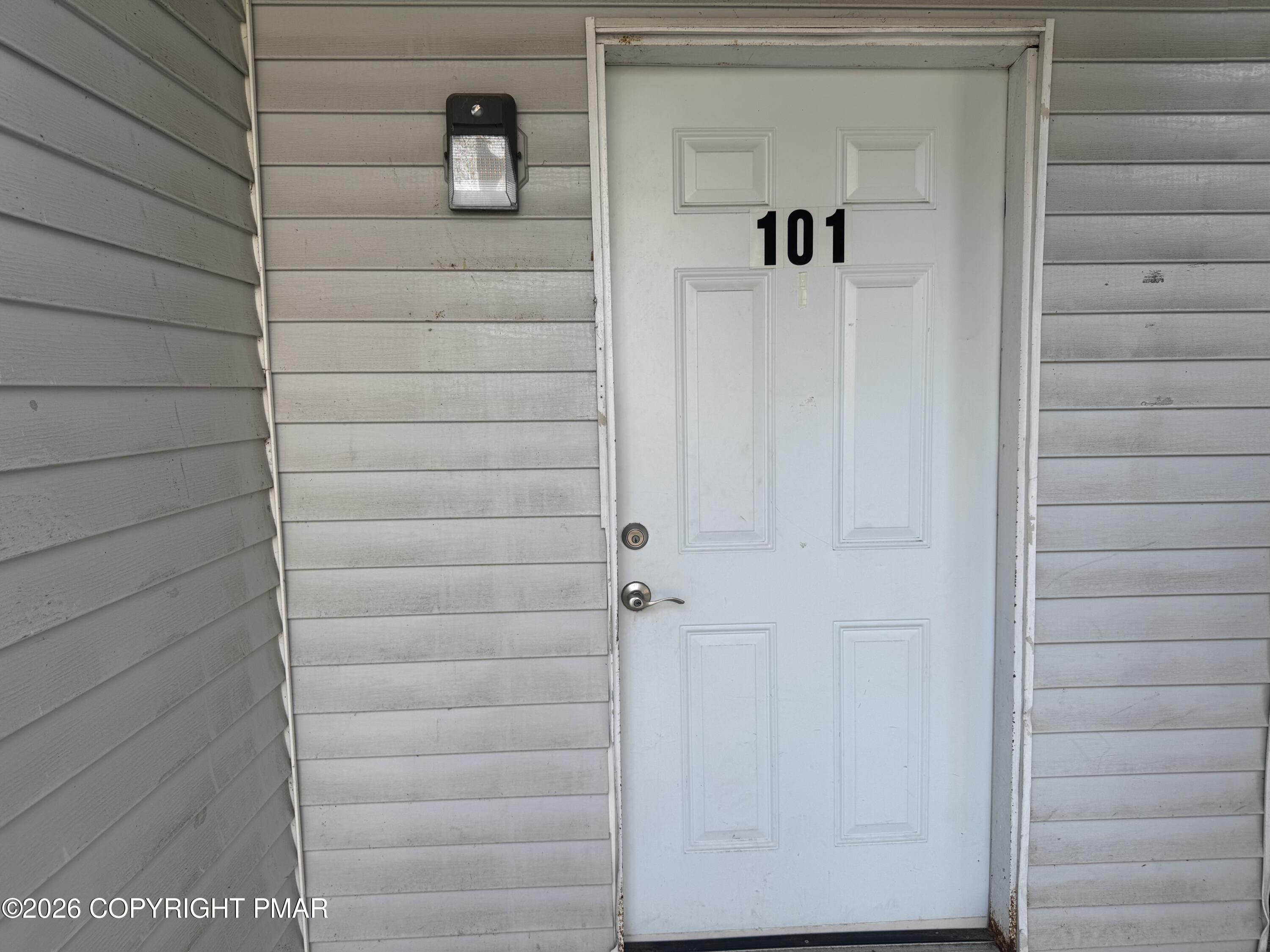 a view of front door and shower