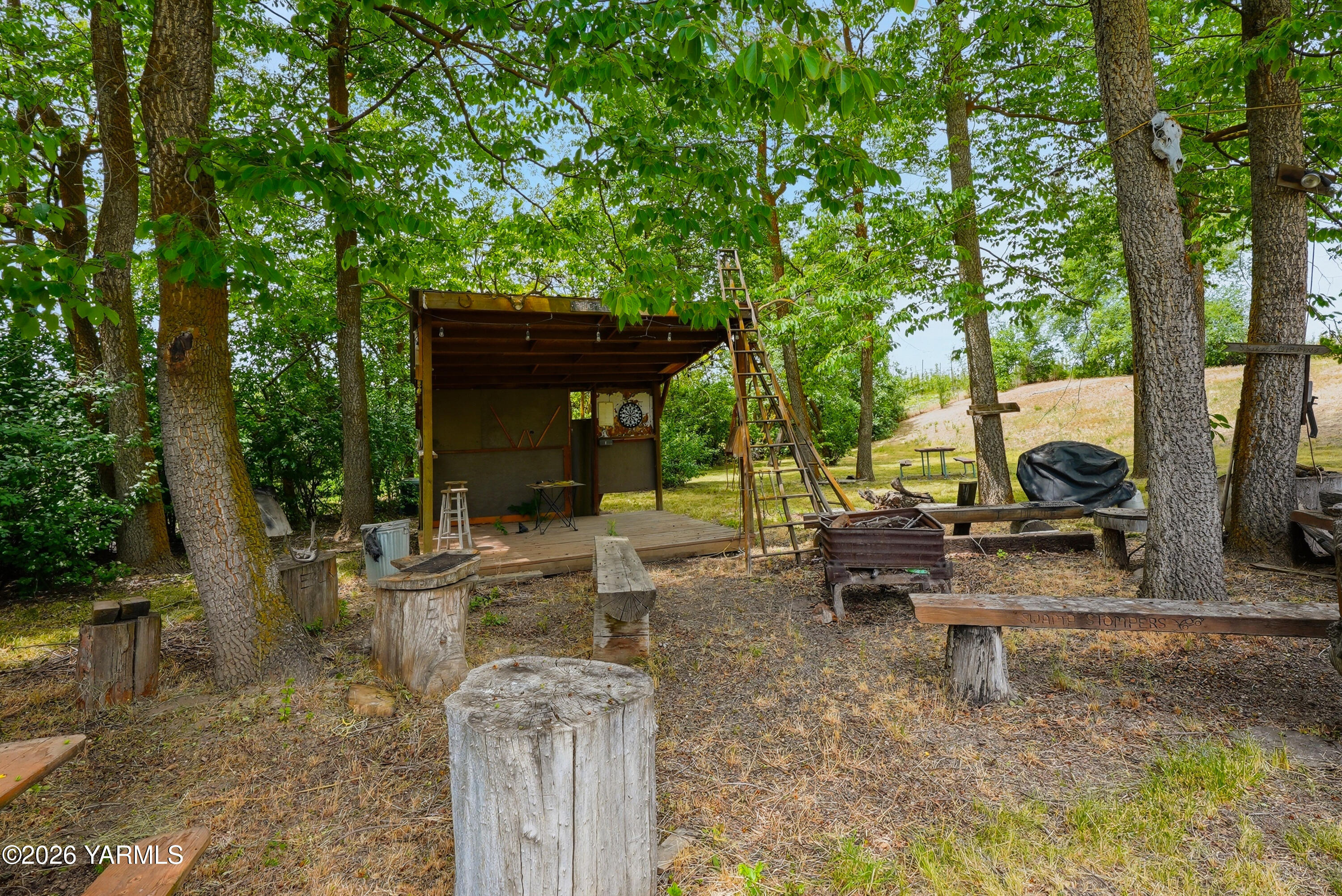 690 North Gleed Road Naches, WA 98937 - Photo 37 of 60 a view of a house with backyard porch and sitting area