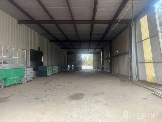 a view of empty room with windows