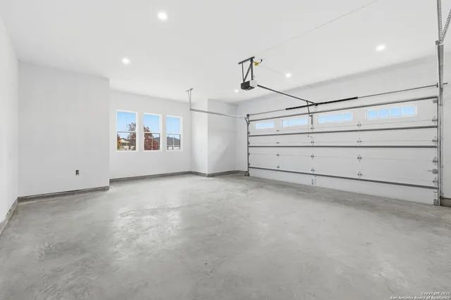 an aerial view of a house with outdoor space