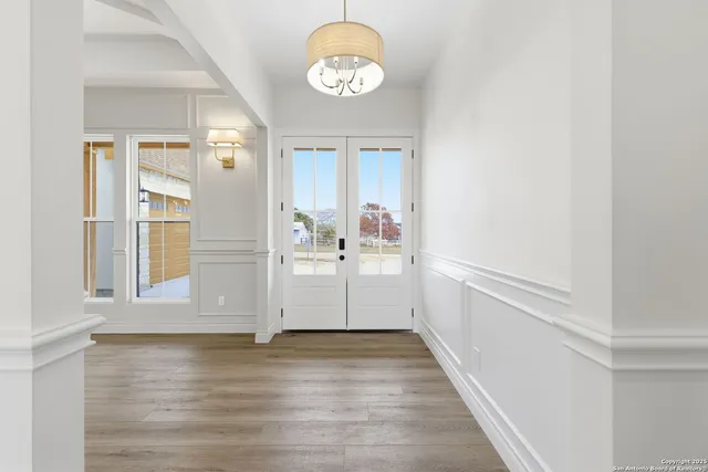 a view of a storage & utility room with wooden floor