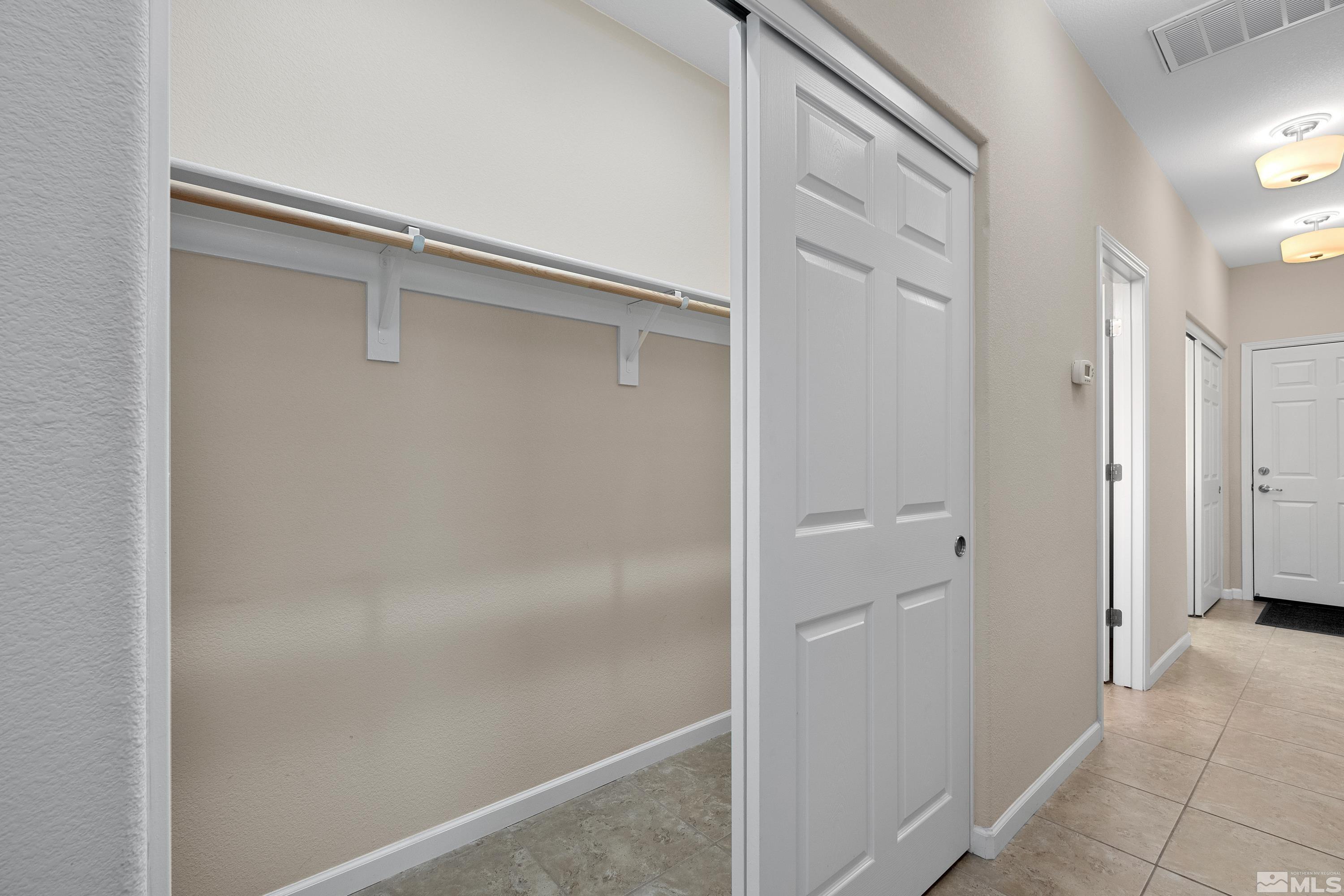 235 Brenham Avenue Reno, NV 89509 - Photo 13 of 32 a bathroom with a glass shower door