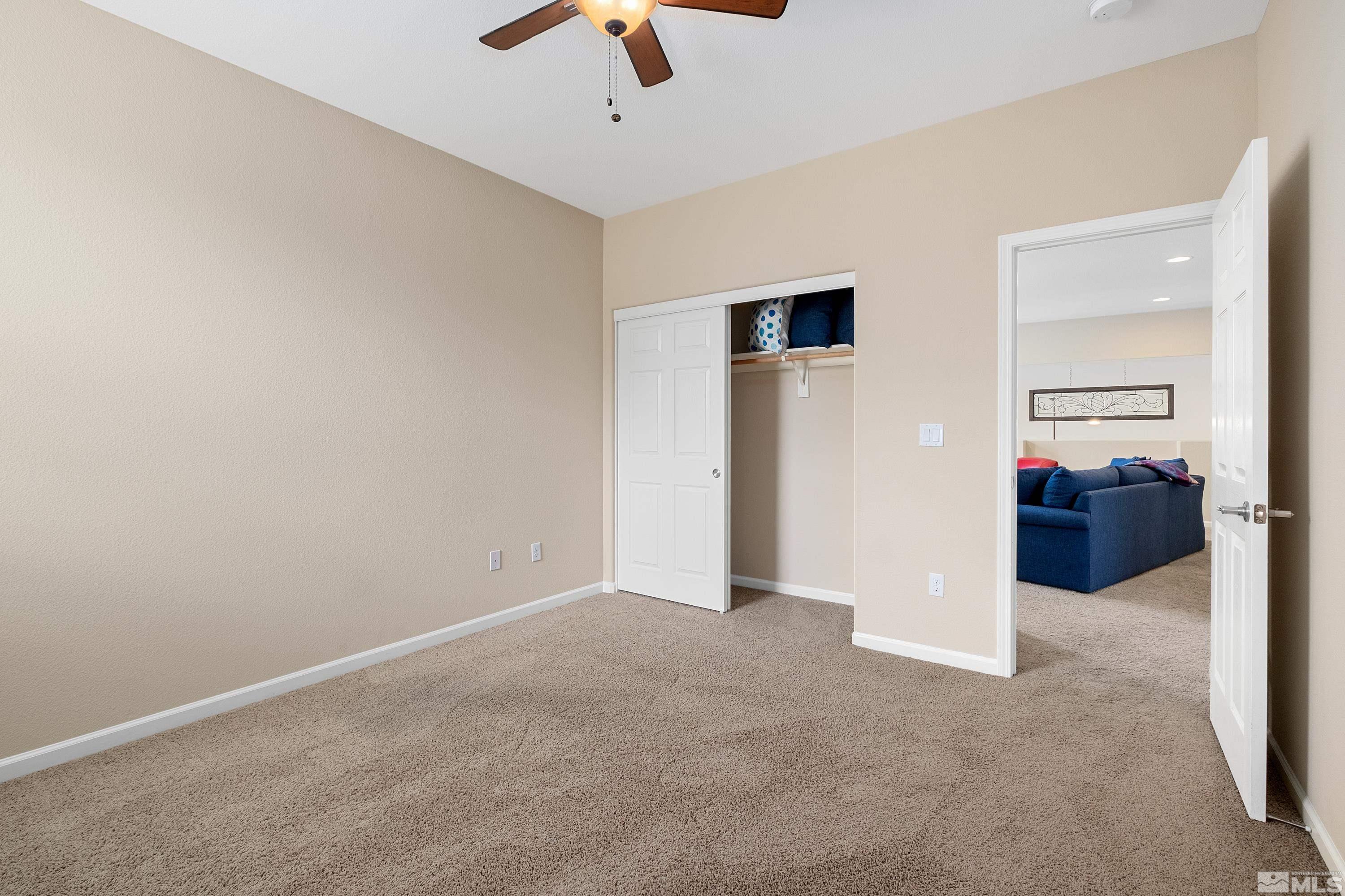 235 Brenham Avenue Reno, NV 89509 - Photo 23 of 32 a view of a livingroom with a ceiling fan