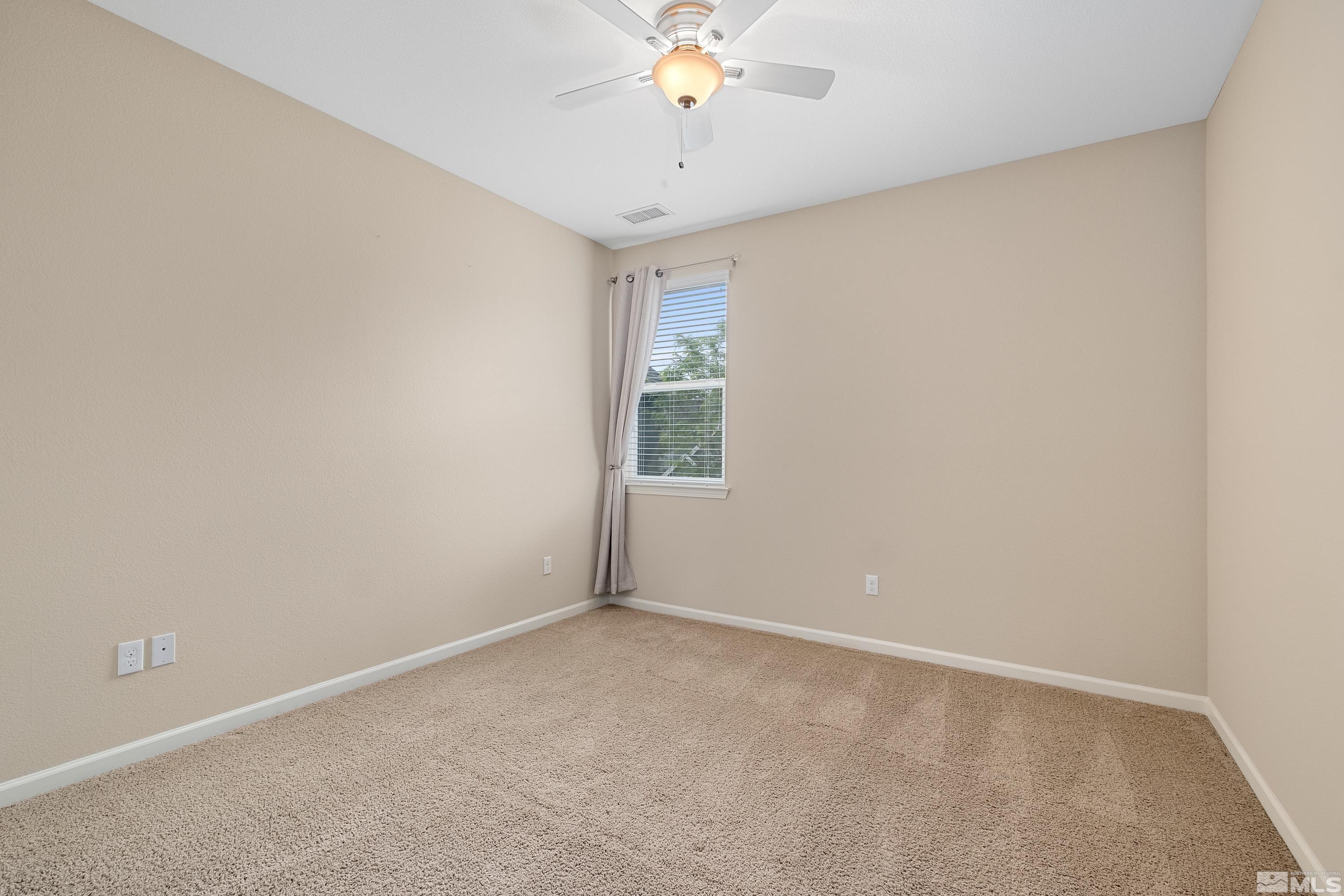 235 Brenham Avenue Reno, NV 89509 - Photo 24 of 32 a view of an empty room with a window