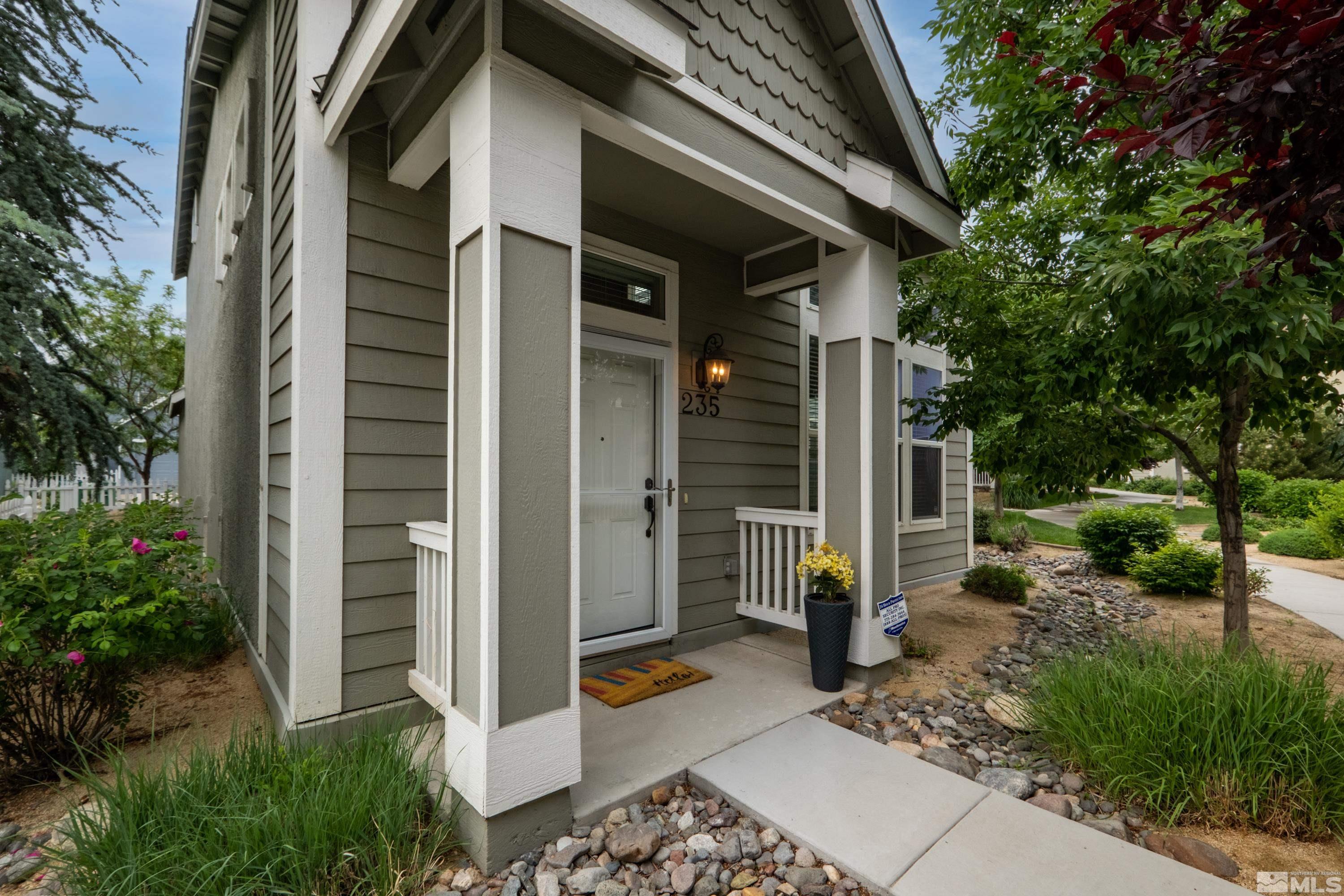 235 Brenham Avenue Reno, NV 89509 - Photo 27 of 32 a view of backyard path with plants and trees