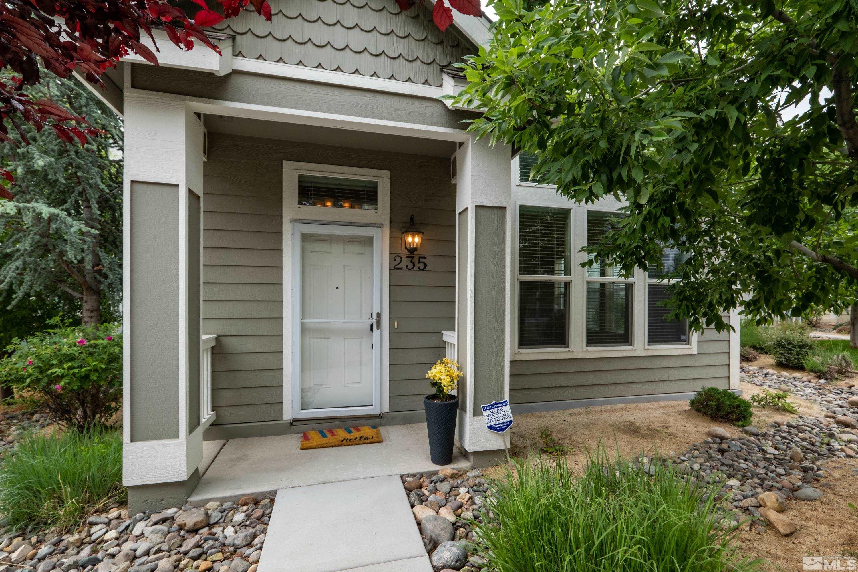 235 Brenham Avenue Reno, NV 89509 - Photo 29 of 32 a front view of a house with a garden