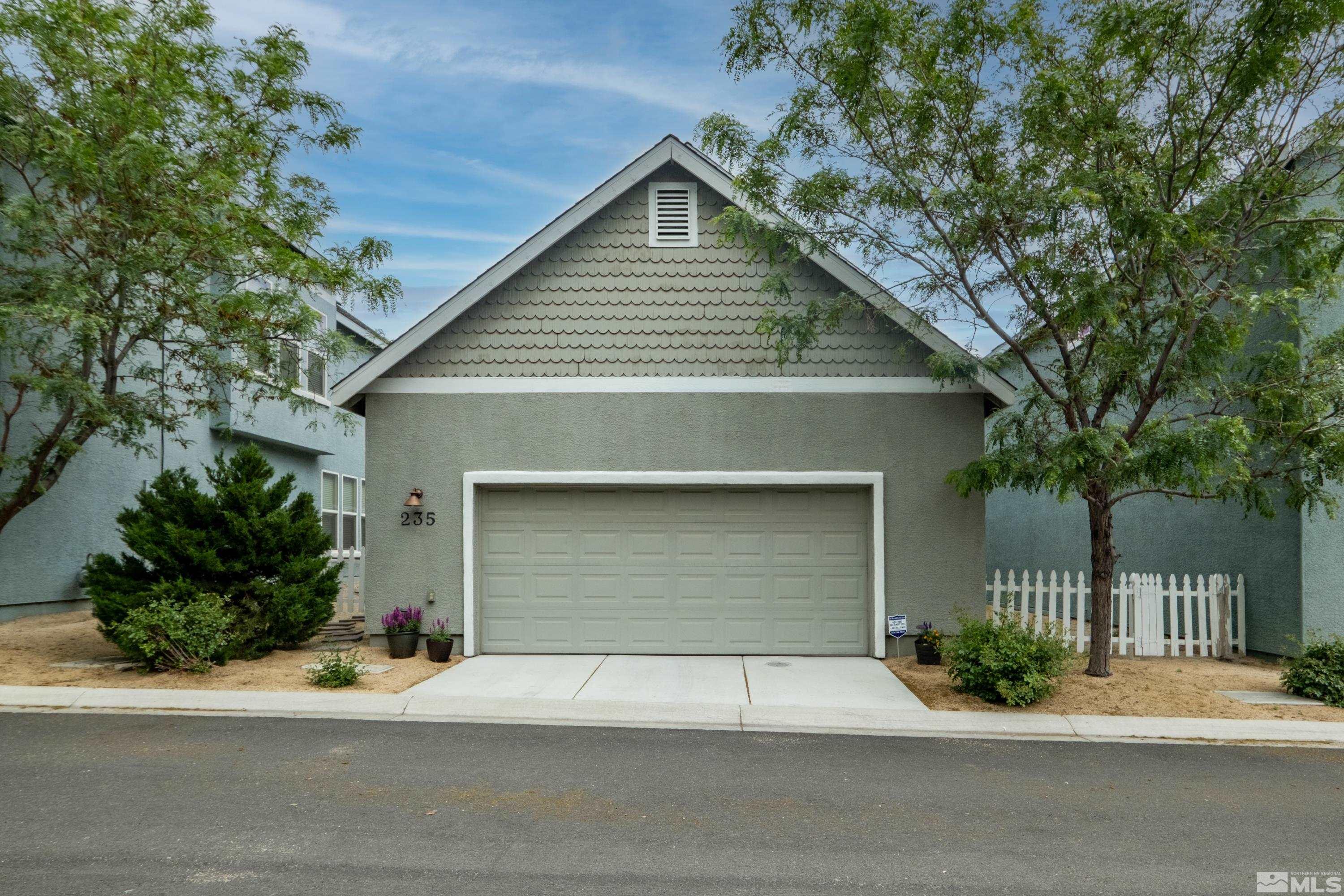 235 Brenham Avenue Reno, NV 89509 - Photo 32 of 32 a front view of a house with garage