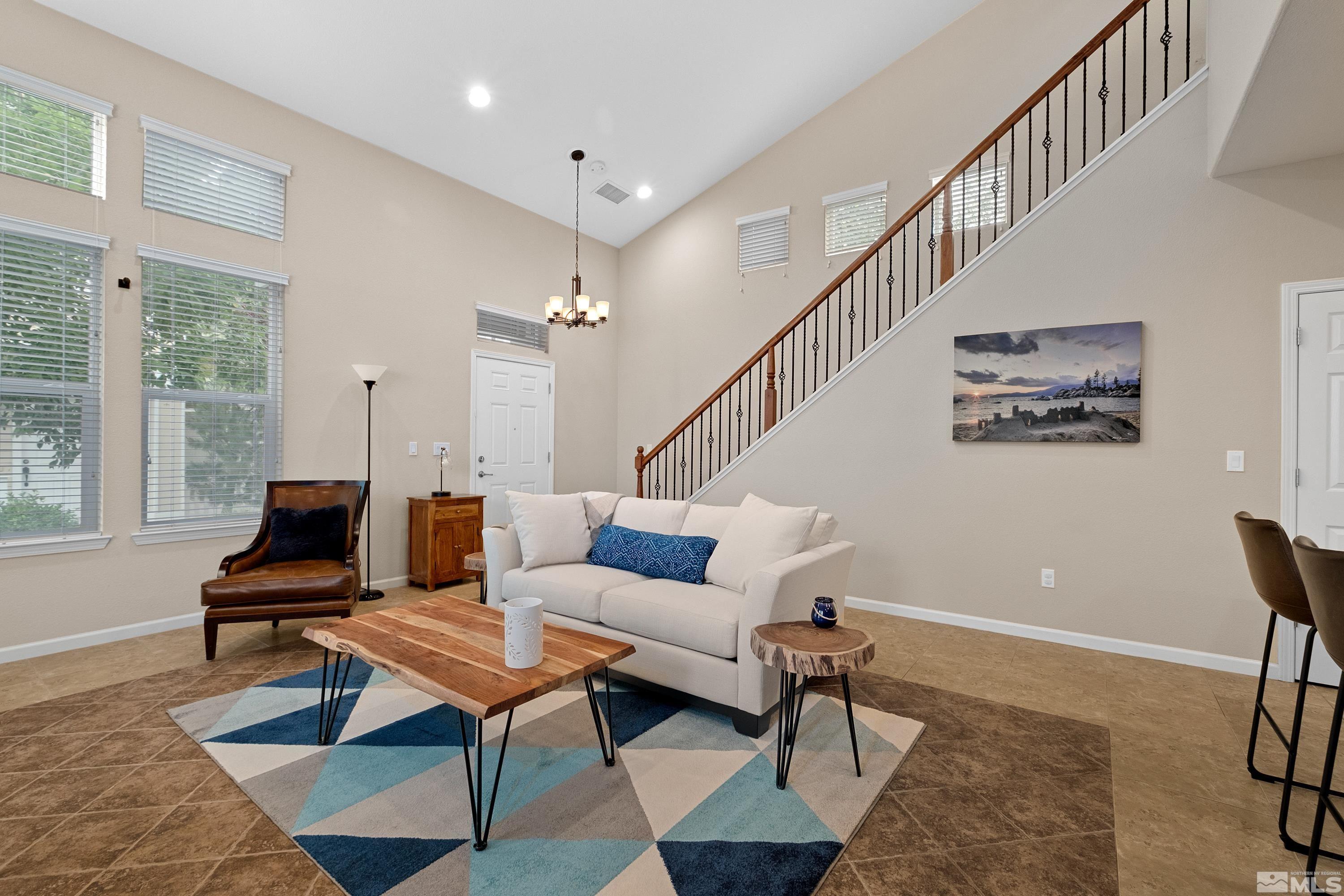 235 Brenham Avenue Reno, NV 89509 - Photo 6 of 32 a living room with furniture and a rug