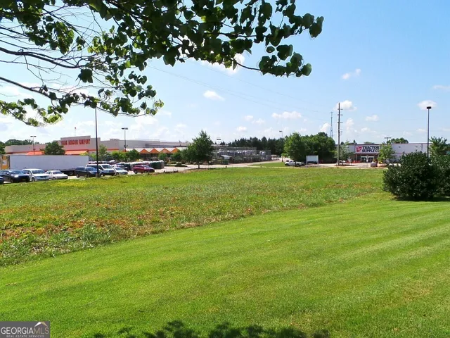 a view of a golf course with a big yard