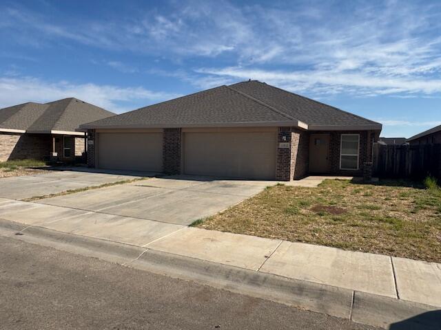 1106 North Englewood Avenue, Unit A&B Lubbock, TX 79416 - Photo 2 of 11 a front view of house with yard