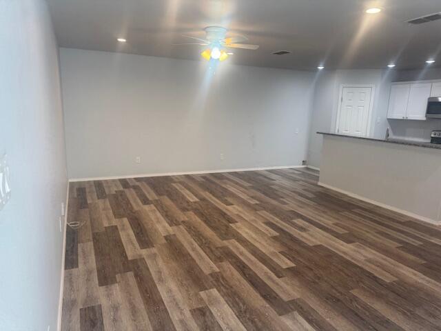 1106 North Englewood Avenue, Unit A&B Lubbock, TX 79416 - Photo 4 of 11 a view of room with wooden floor