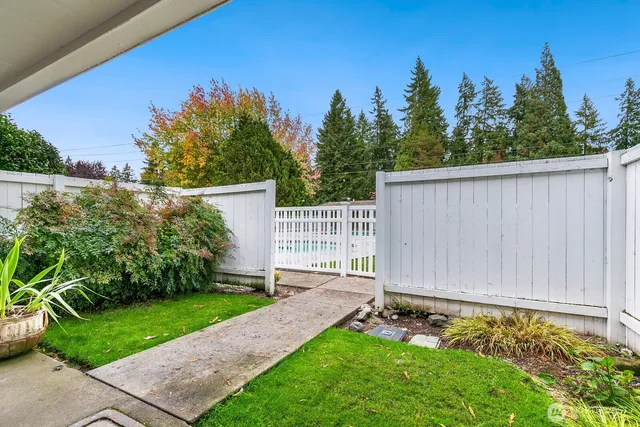 a view of a backyard with a garden