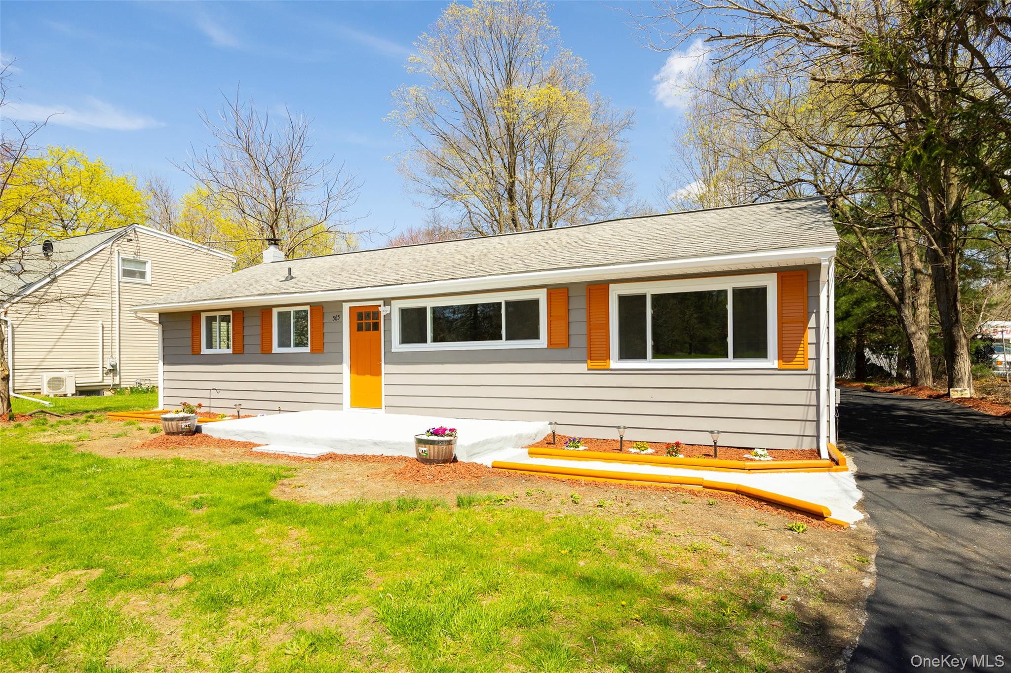 565 Old Hopewell Road Hopewell Junction, NY 12533 - Photo 16 of 23 View of front of property with a shingled roof, a front lawn, and a chimney