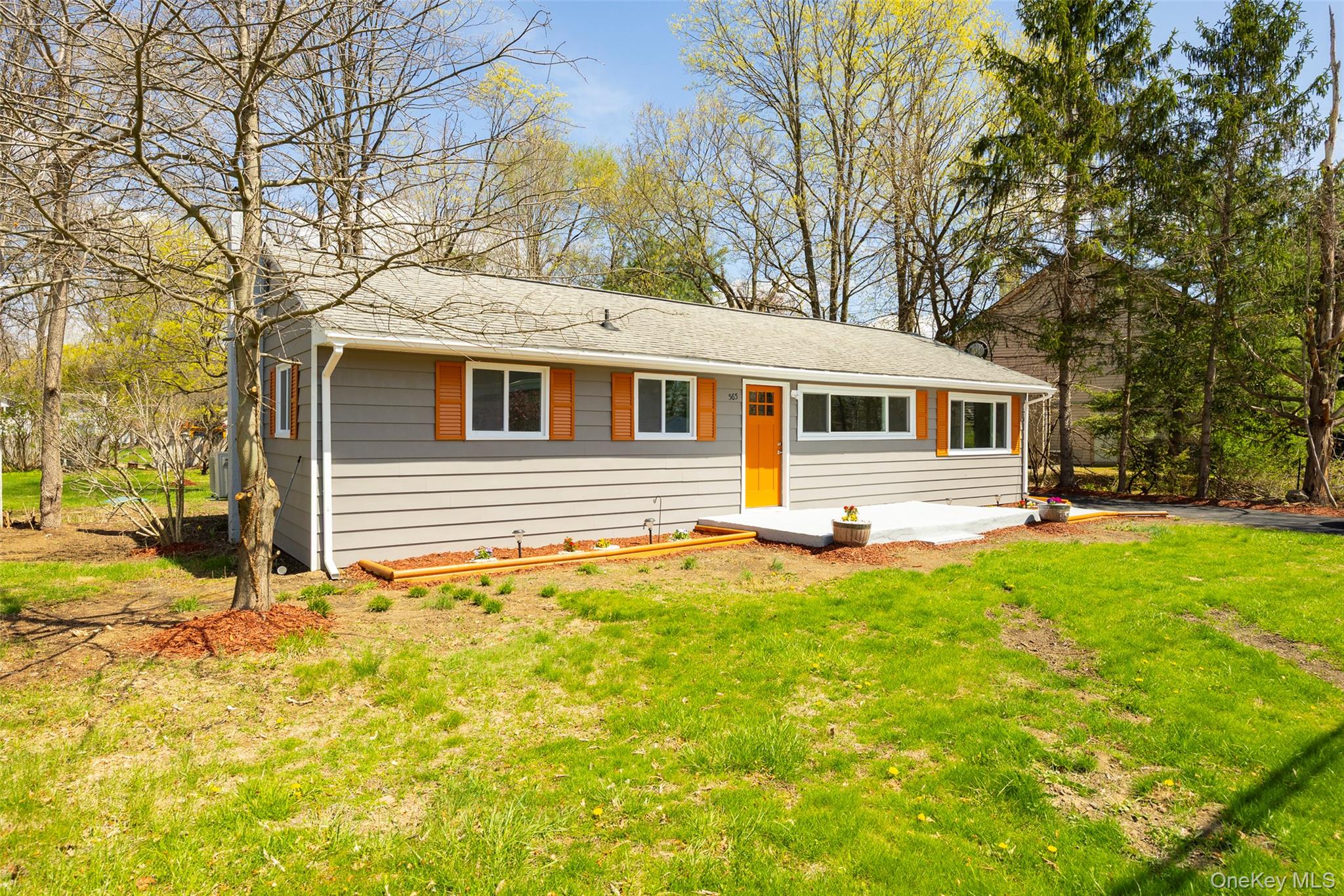 565 Old Hopewell Road Hopewell Junction, NY 12533 - Photo 17 of 23 Single story home featuring a front lawn and a patio