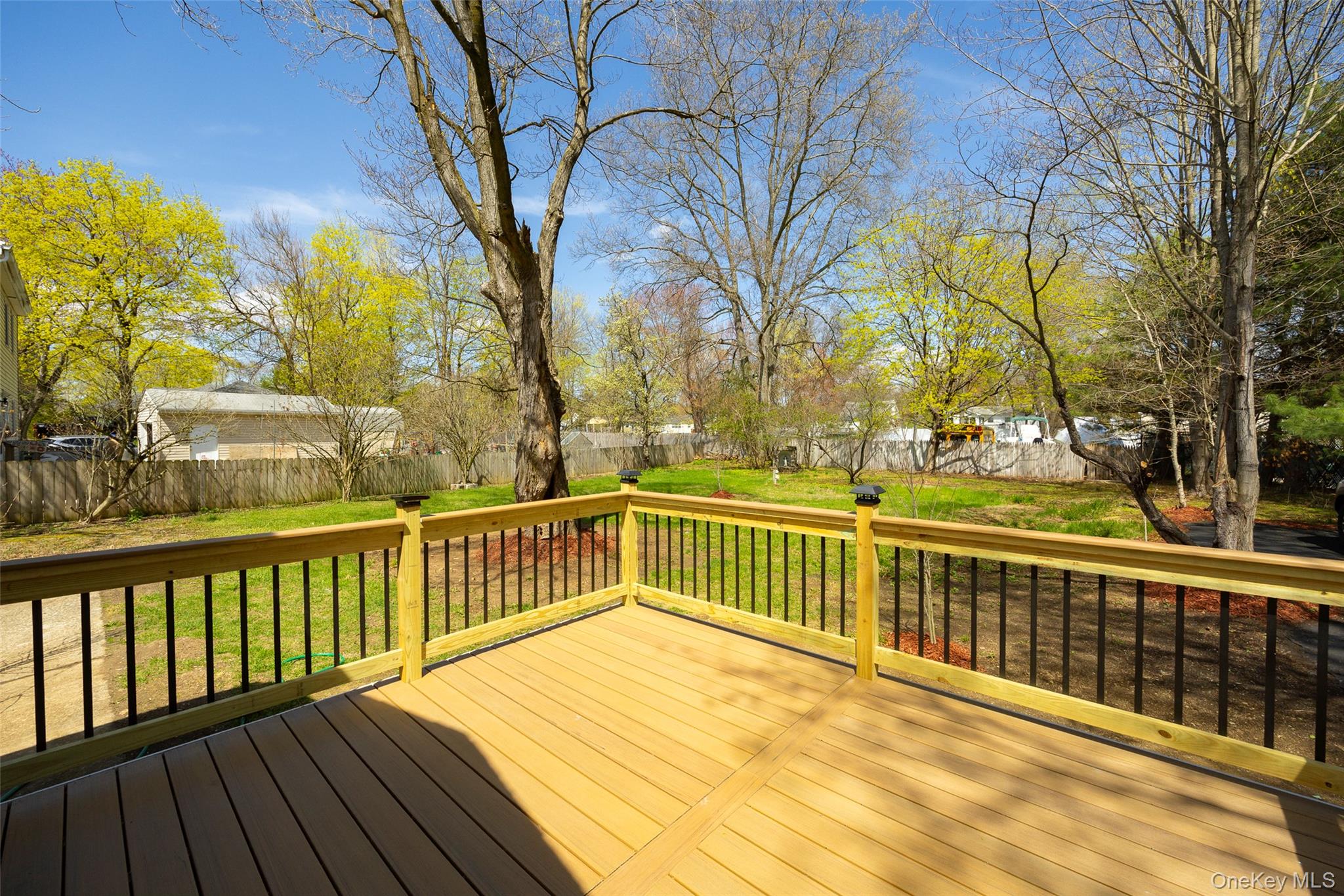 565 Old Hopewell Road Hopewell Junction, NY 12533 - Photo 21 of 23 Wooden terrace featuring a fenced backyard