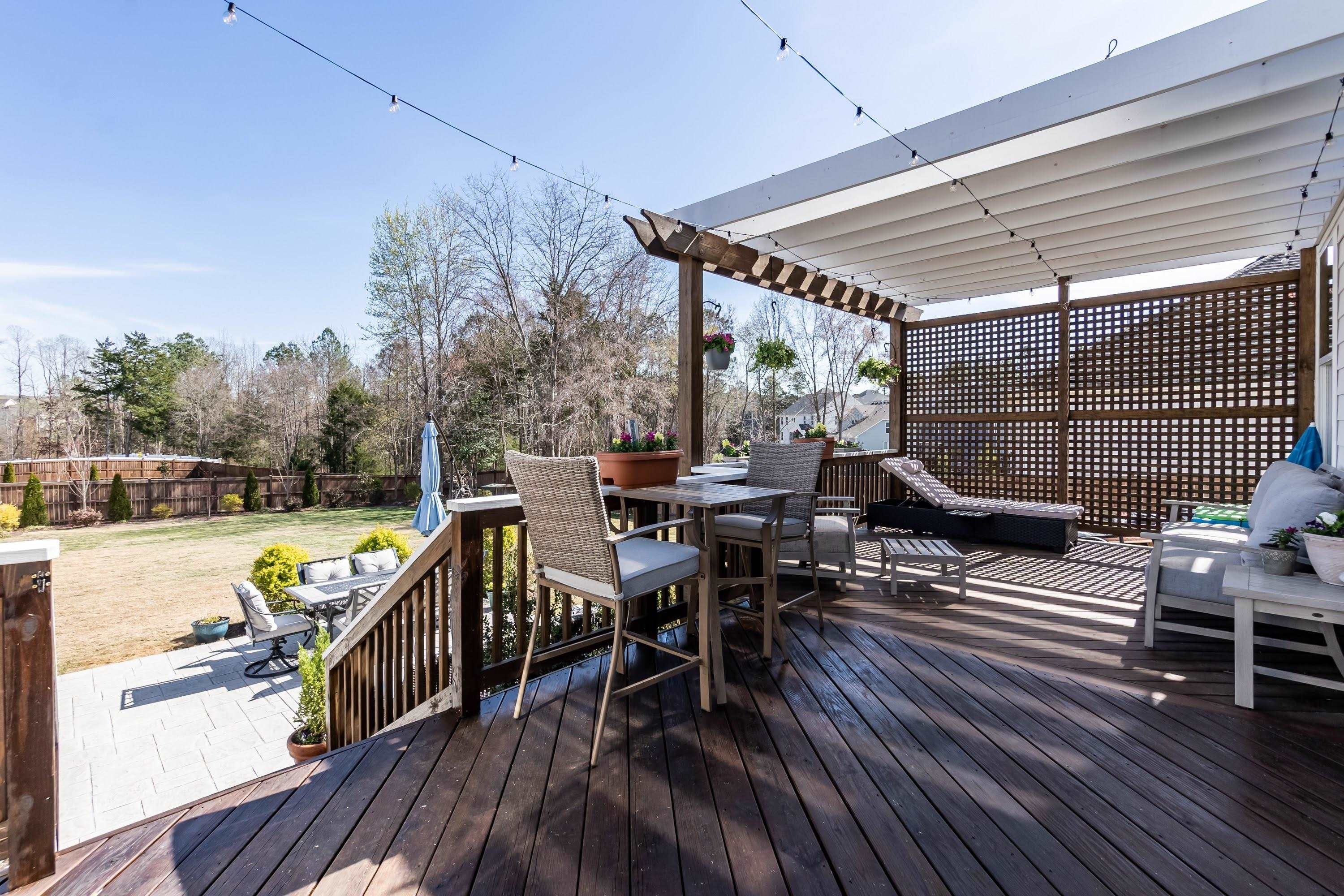492 Adkins Ridge Road Rolesville, NC 27571 - Photo 8 of 14 a view of a balcony with chairs