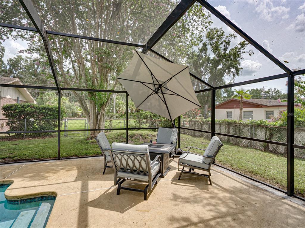 609 West Pipkin Road Lakeland, FL 33813 - Photo 54 of 72 a roof deck with table and chairs