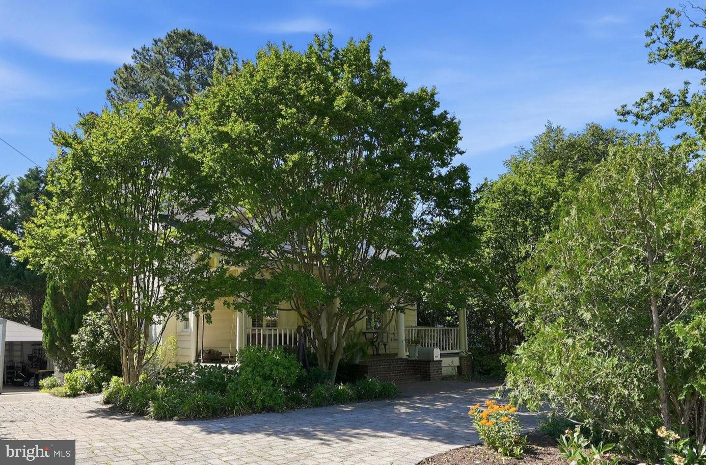 6814 Brookville Road Chevy Chase, MD 20815 - Photo 37 of 39 Charming home embraced by lush greenery.