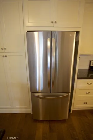 a view of a refrigerator in the kitchen