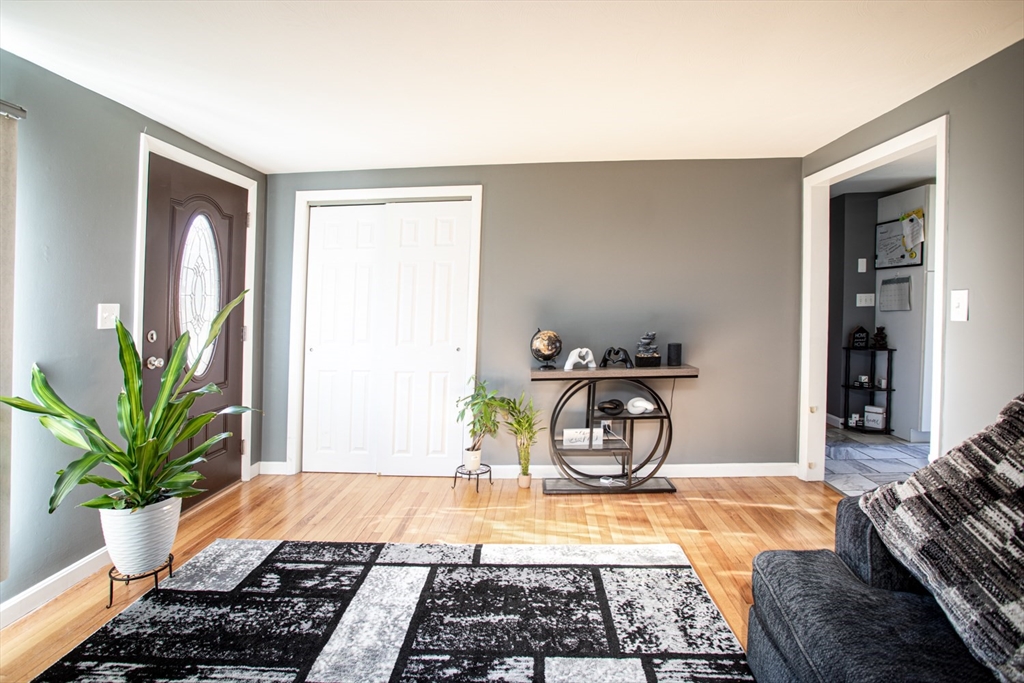 350 Gifford Road Westport, MA 02790 - Photo 13 of 39 a bed room with a bed and a potted plant