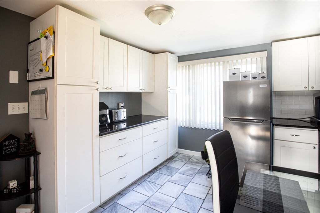 350 Gifford Road Westport, MA 02790 - Photo 18 of 39 a kitchen with stainless steel appliances granite countertop a refrigerator sink and cabinets