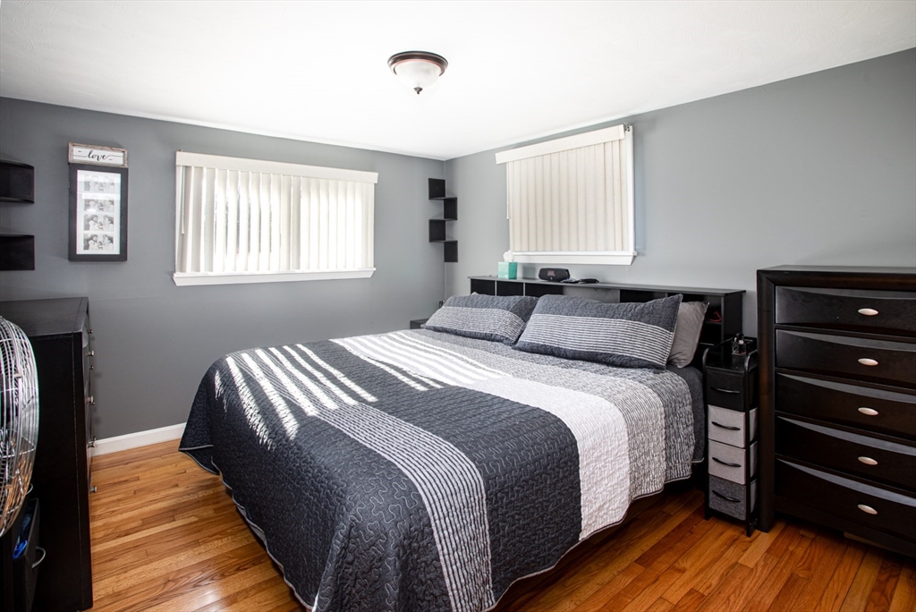 350 Gifford Road Westport, MA 02790 - Photo 20 of 39 a bedroom with a bed and a dresser