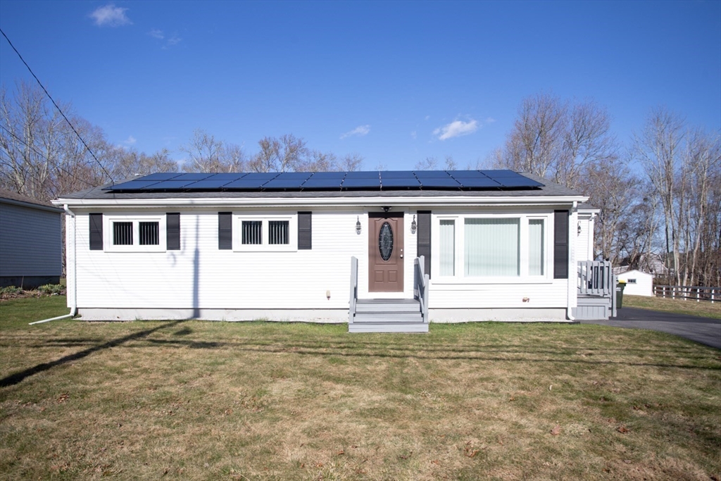 350 Gifford Road Westport, MA 02790 - Photo 2 of 39 a view of a house with a backyard