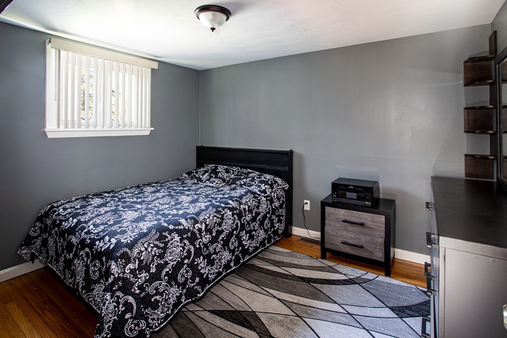 350 Gifford Road Westport, MA 02790 - Photo 23 of 39 a bedroom with bed dresser and a window