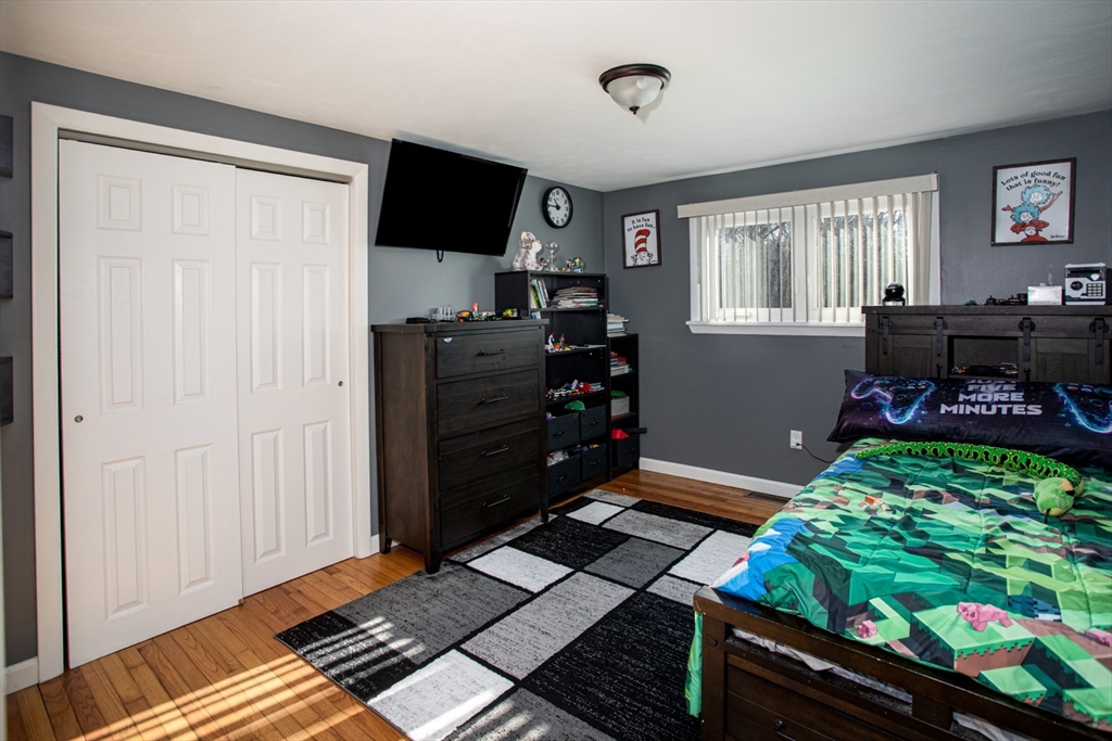 350 Gifford Road Westport, MA 02790 - Photo 24 of 39 a room with furniture a flat screen tv and a window