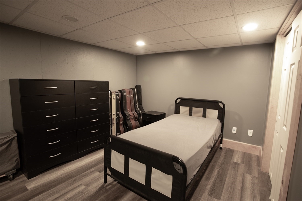 350 Gifford Road Westport, MA 02790 - Photo 34 of 39 a room with a bed and a dresser