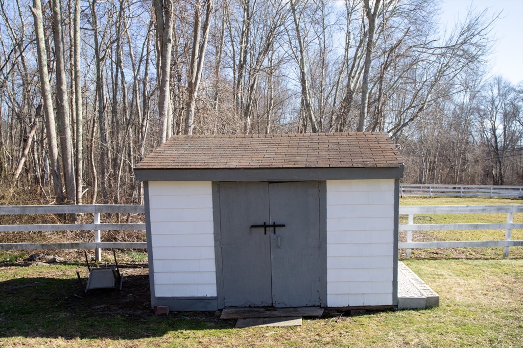 350 Gifford Road Westport, MA 02790 - Photo 9 of 39 a backyard of a house with lots of green space