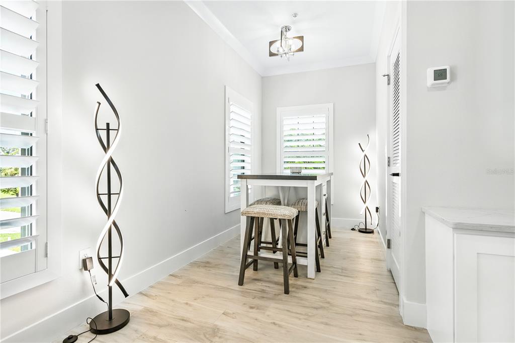1234 15th Street, Unit 201 Sarasota, FL 34236 - Photo 16 of 29 a view of a room with furniture and wooden floor