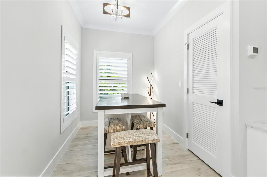 1234 15th Street, Unit 201 Sarasota, FL 34236 - Photo 17 of 29 a dining room with furniture and window