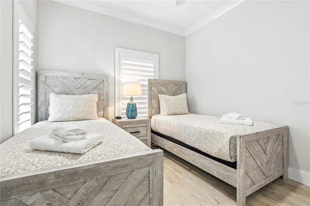 1234 15th Street, Unit 201 Sarasota, FL 34236 - Photo 24 of 29 a bedroom with a bed and window