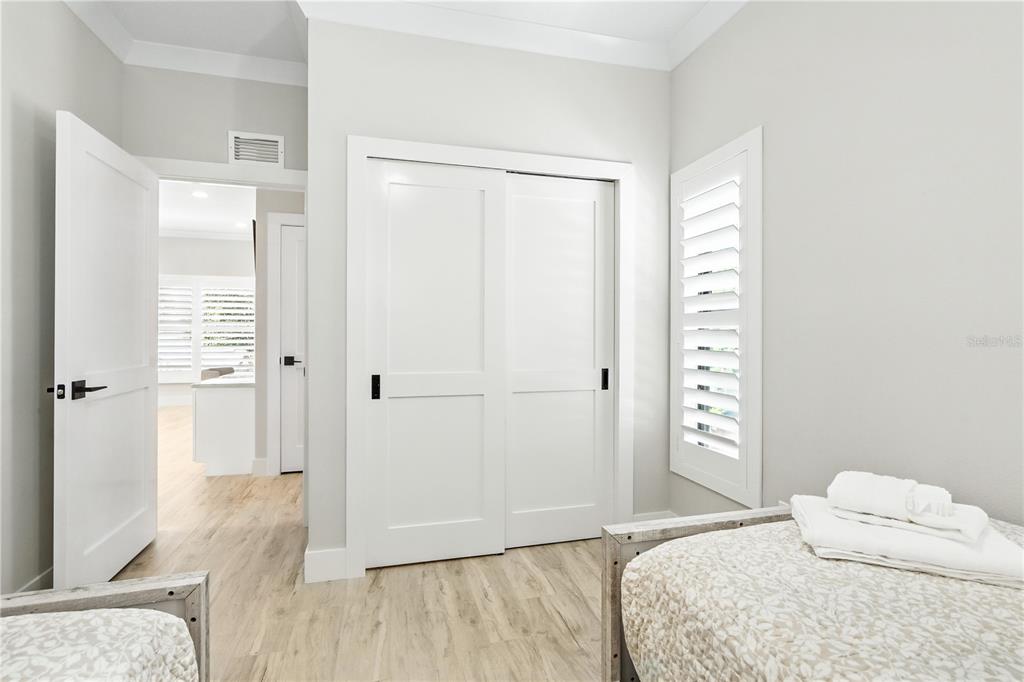 1234 15th Street, Unit 201 Sarasota, FL 34236 - Photo 25 of 29 a bedroom with a bed and a window