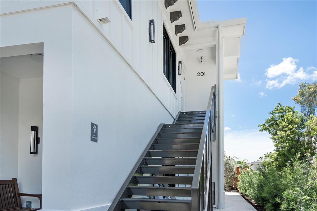 1234 15th Street, Unit 201 Sarasota, FL 34236 - Photo 5 of 29 a view of entryway and hall with wooden floor